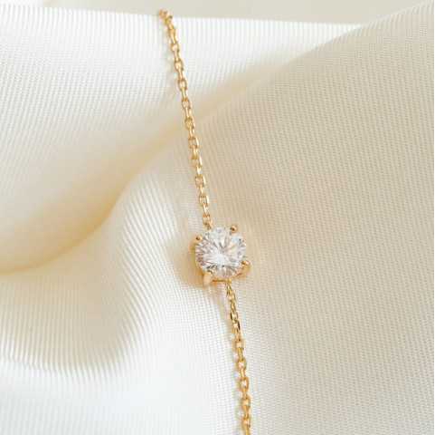 Pulsera solitario chapada en oro