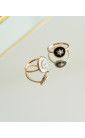 Anillo medallón de sol negro chapado en oro con acumulación