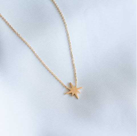Collar de estrellas doradas
