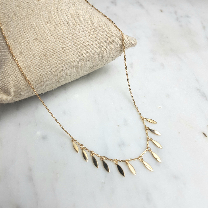 Gold-plated woman's necklace with hanging charms